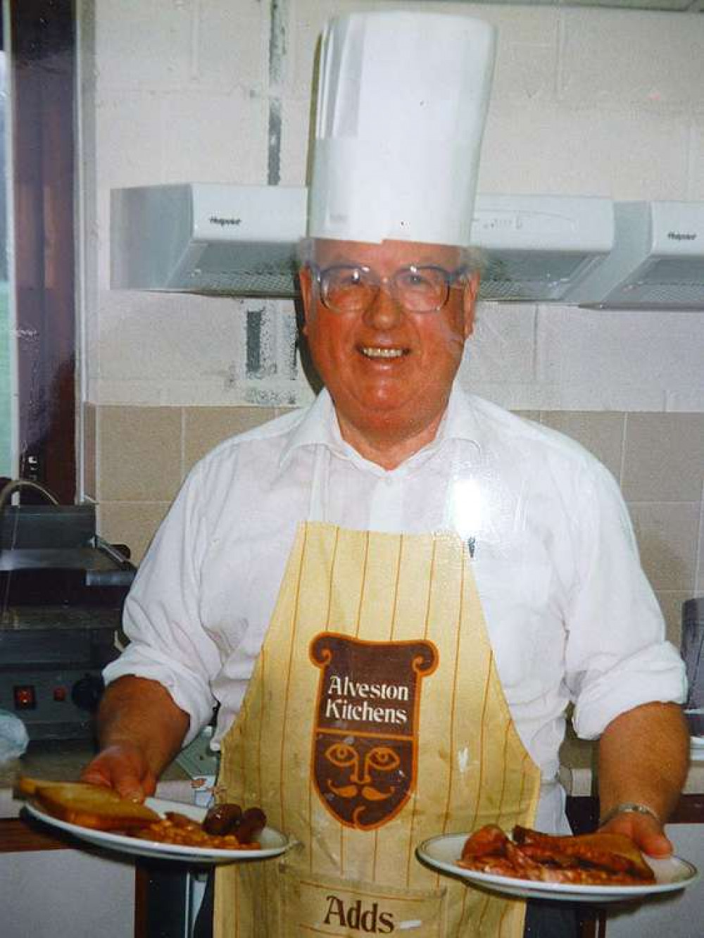 Les Haynes serving breakfast at a cricket match on the morning of 1st January 2000.