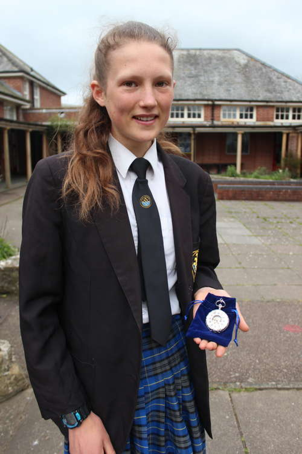 Innes Fitzgerald with the silver pocket watch presented to her by Axe Valley Academy