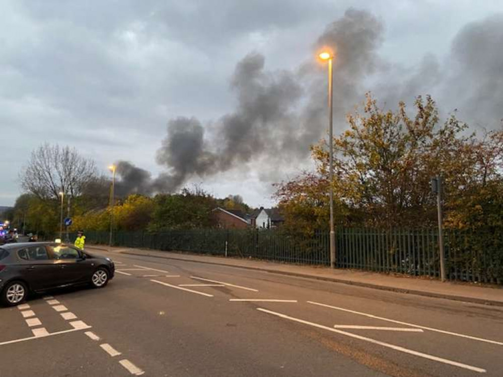 The smoke is easing as firefighters begin to get the incident under control. Photo Credit: Tom Surgay.