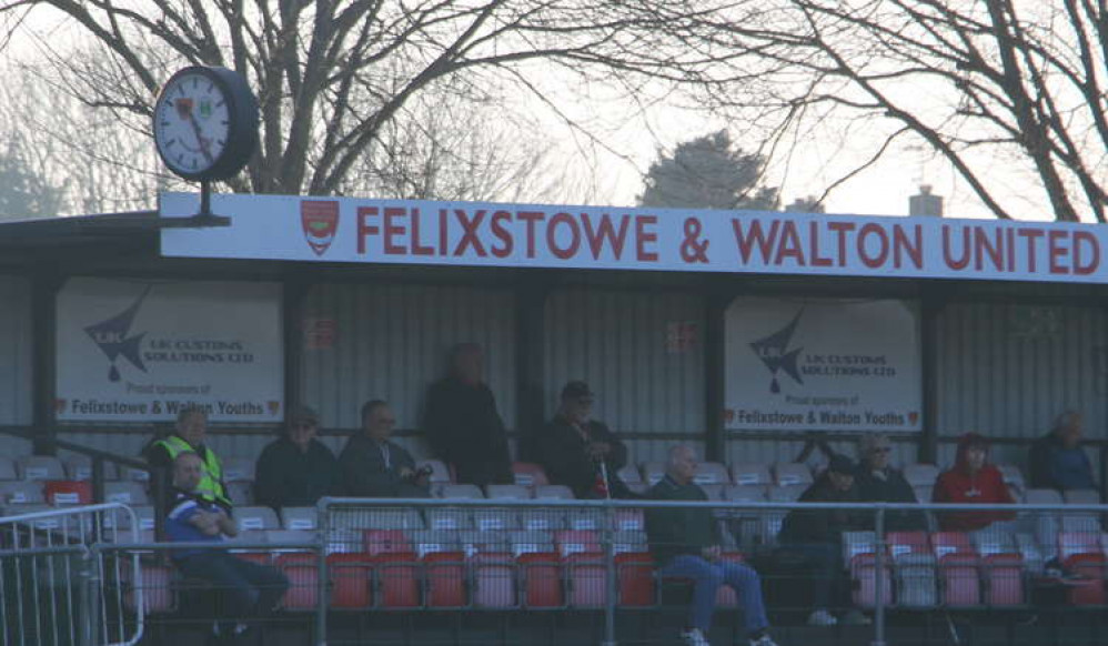 Dr Coffey joins fans in the stand