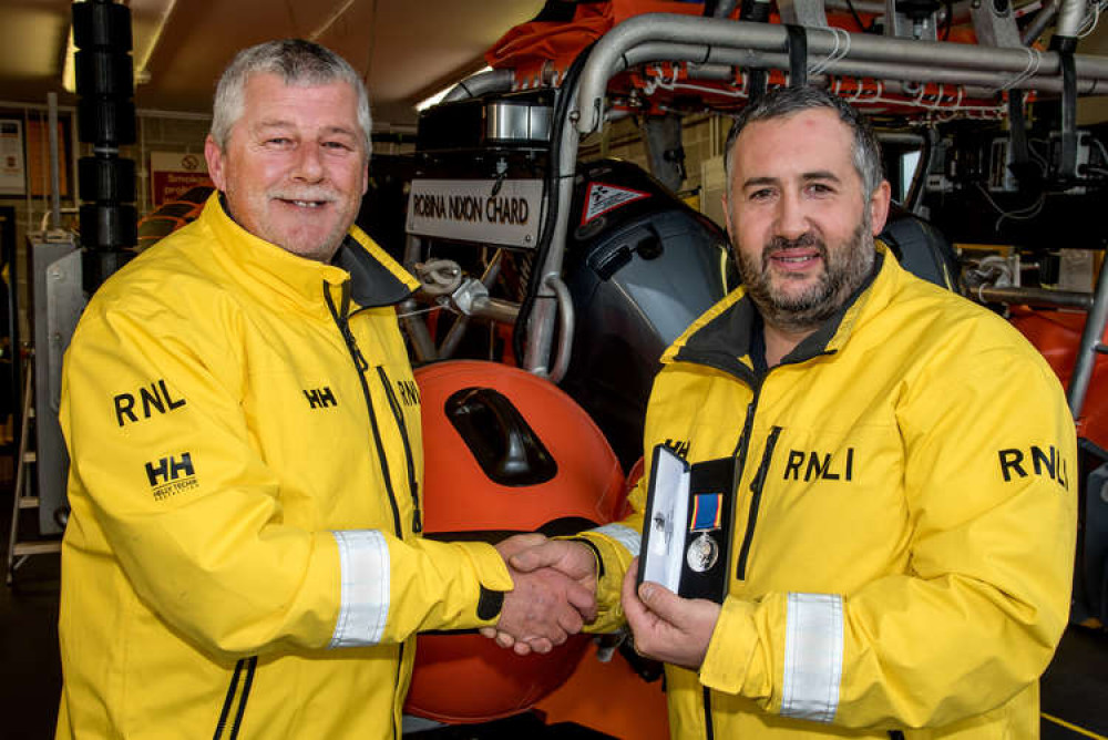 Tom being presented the award. Credit: RNLI/Simon Culliford.