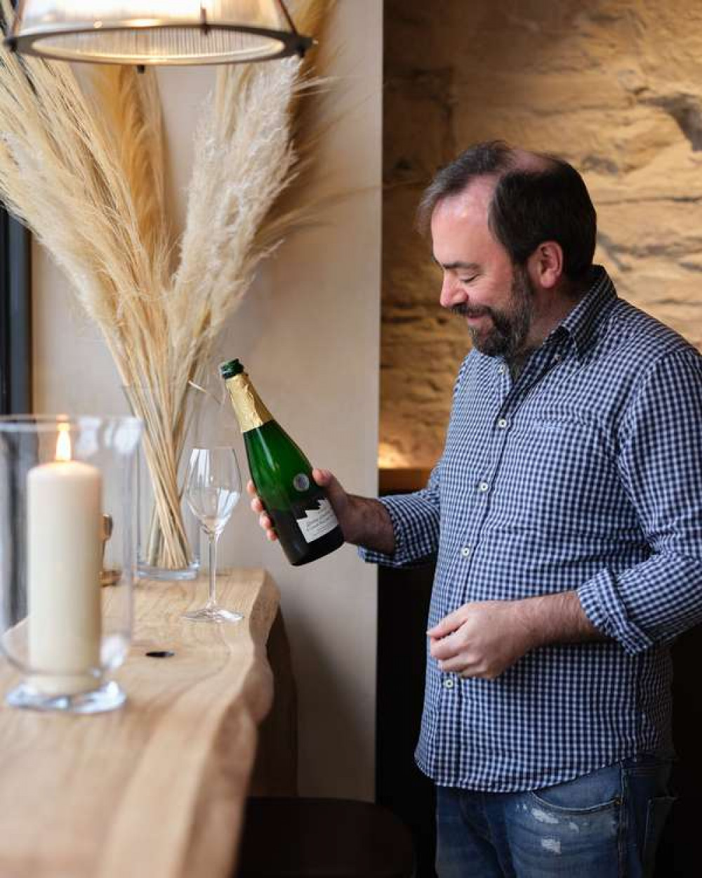 Owner Derek Crookes pouring a glass at Kernowine.