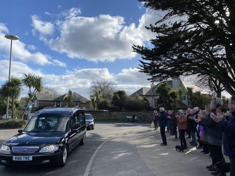 Falmouth RFC supporters, players and volunteers gathered outside the club this afternoon to pay their respects to Dave Thomas.