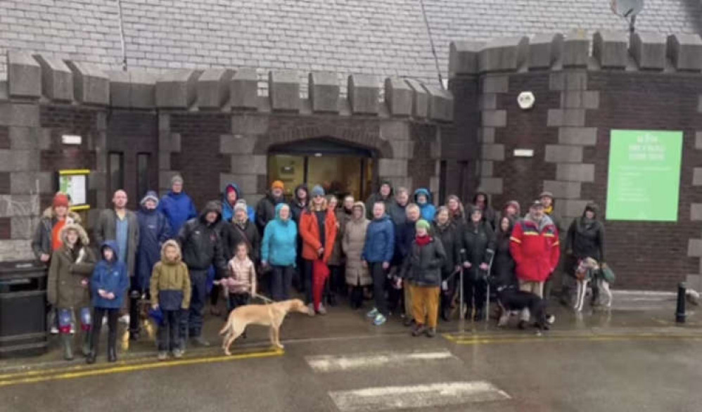 A group made up of Pendennis Leisure, local councillors, residents, and leisure centre users, gathers outside the centre.