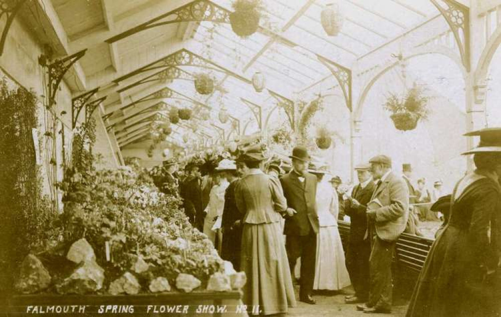 Visitors to the first flower show on the promenade at Gyllyngdune Gardens. The show is still held there today in the Princess Pavilion which was opened in 1911. Photo credit: The Poly. Visitors to the first flower show on the promenade at Gyllyngdune Gardens. The show is still held there today in the Princess Pavilion which was opened in 1911. Photo credit: The Poly.