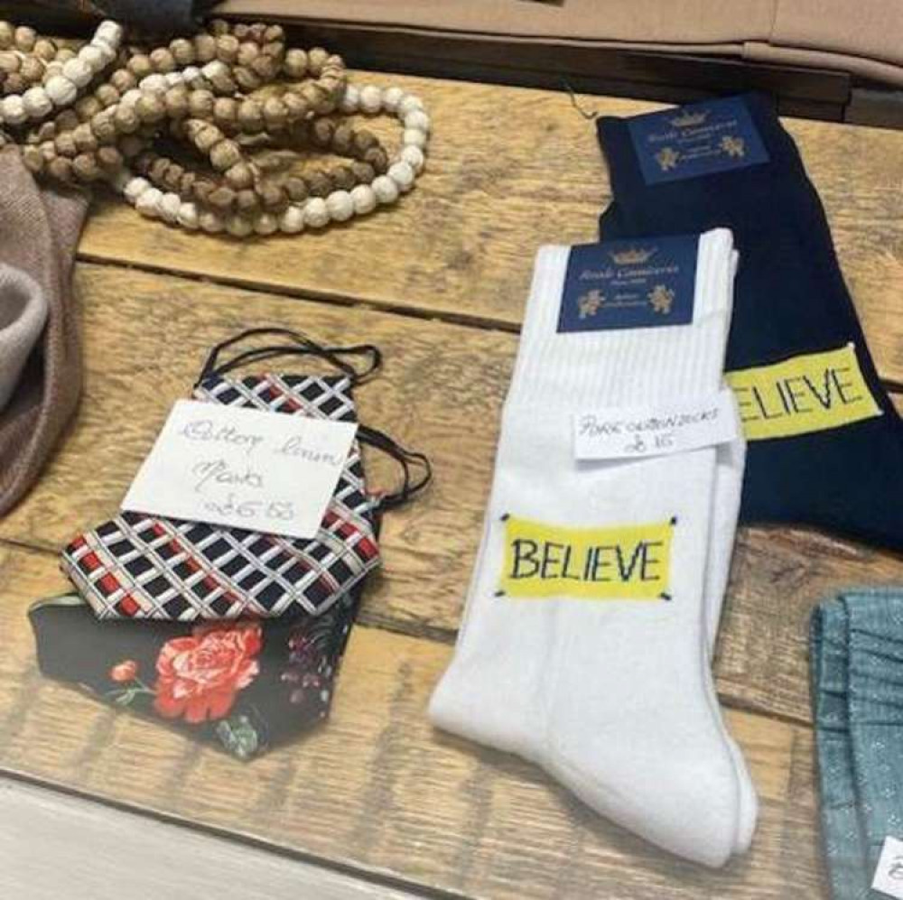 Socks are embroidered with Ted's favourite mantra 'BELIEVE'