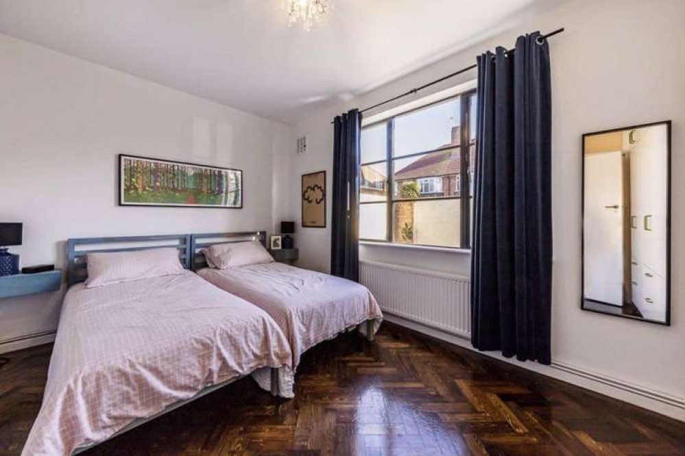 The bedroom with bespoke double glazed Crittall style windows (Image: Dexters)