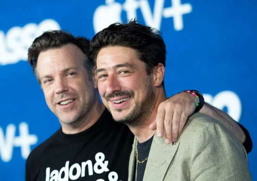 Actor Jason Sudeikis (Ted Lasso, left) and British musician and writer Marcus