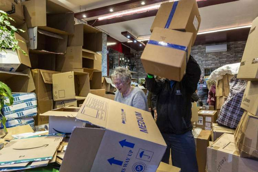 Prosperity Cafe - making boxes. Prosperity Cafe - making boxes.