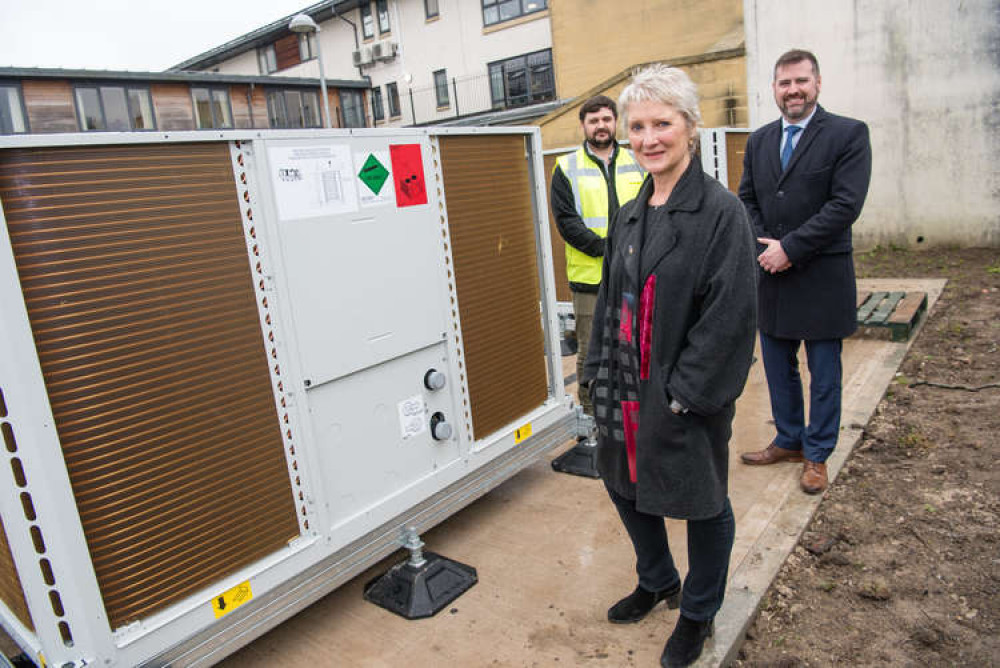 Pictured with Councillor Alison Born, cabinet member for Adult Services are l-r Ricky Smith contracts supervisor MFM, and Councillor Kevin Guy, council leader at Charlton House where the air source heat pump is being installed.