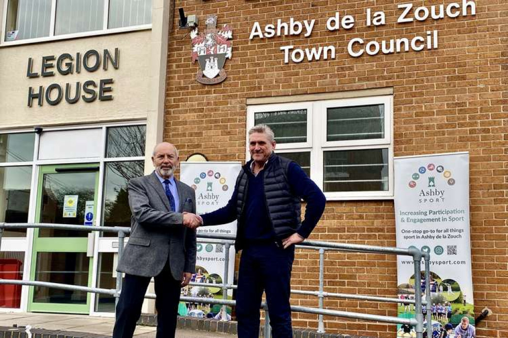 Ashby Sport's Ken Horn shakes hands with Cllr Dan Harrison outside Legion House in South Street