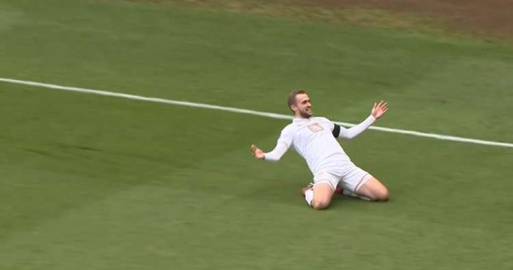 James Wilson celebrating after scoring one of his three goals against Accrington Stanley.