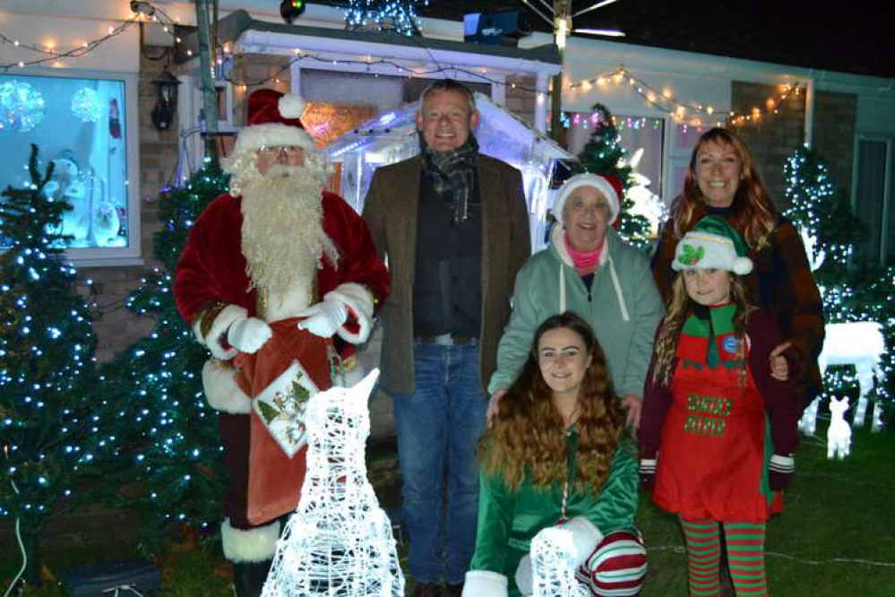 Martin Clunes turned on the Christmas lights at Monica and Rob Teague's home in Bradpole