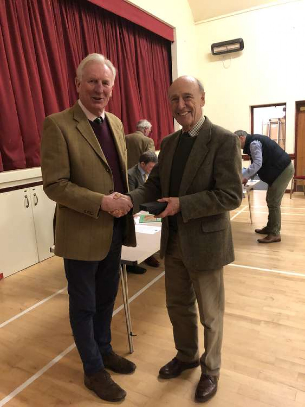 President Nigel Jones presents retirement gift to director and chairman of Discover Farming Marcus Beresford