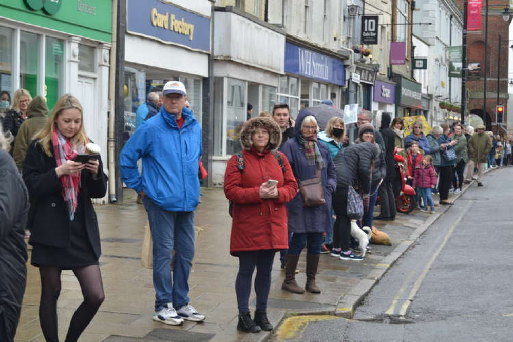 Crowds lined the street in anticipation of the Olympian's arrival