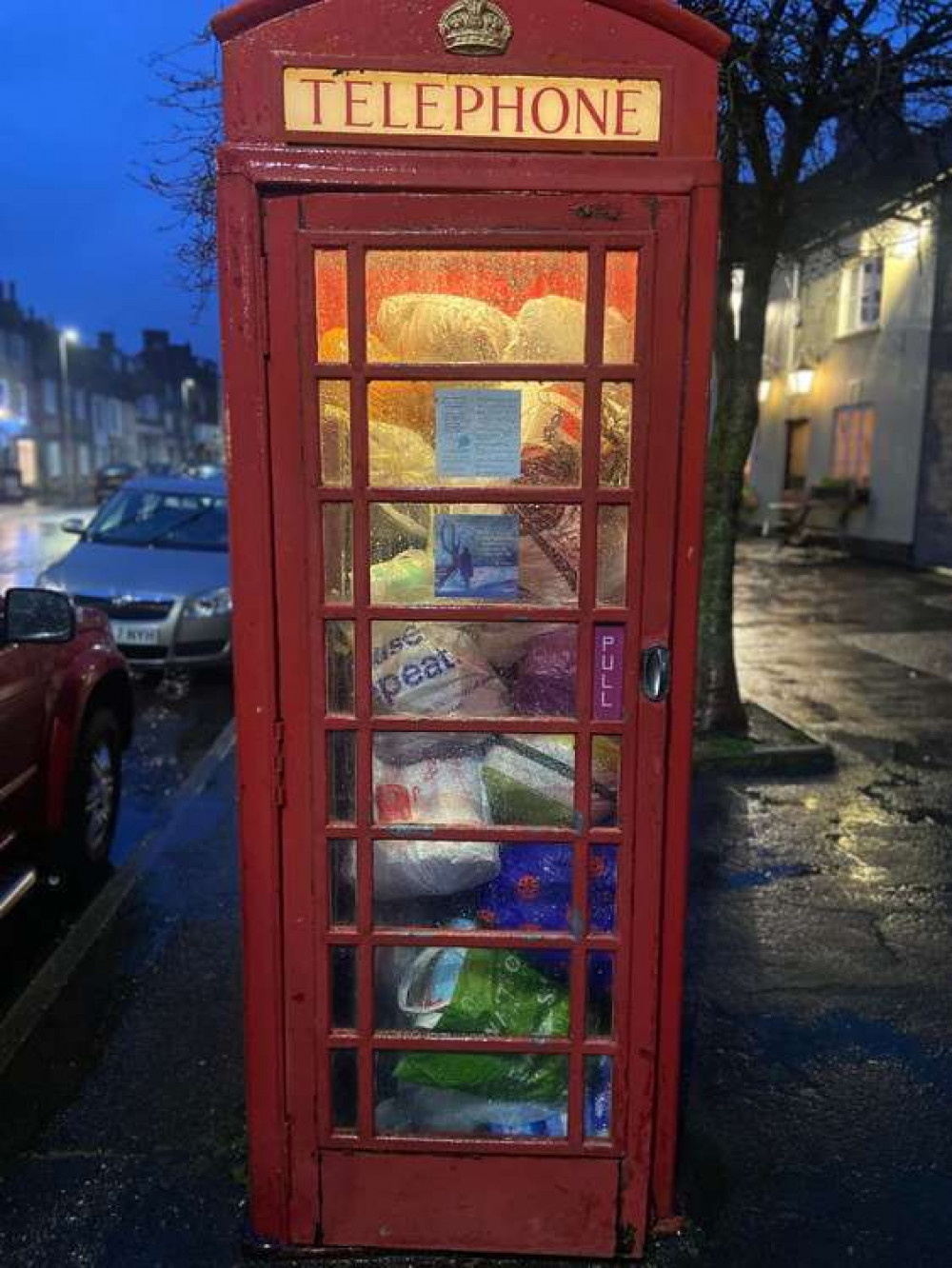 Donations in the telephone box in South Street