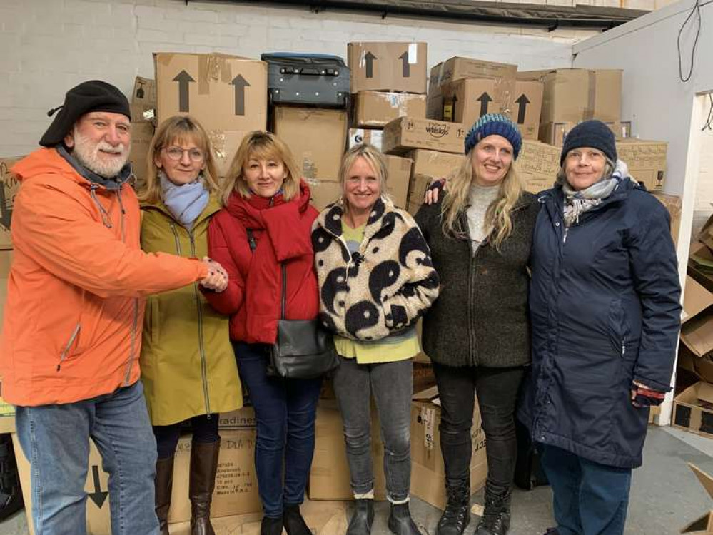 Valentyna, third left, shaking hands with Bridport mayor Cllr Ian Bark, next to Jane Wain, third right, and her friend Sarah, second left, Claire Nutall, second right, and mayoress Anne Bark