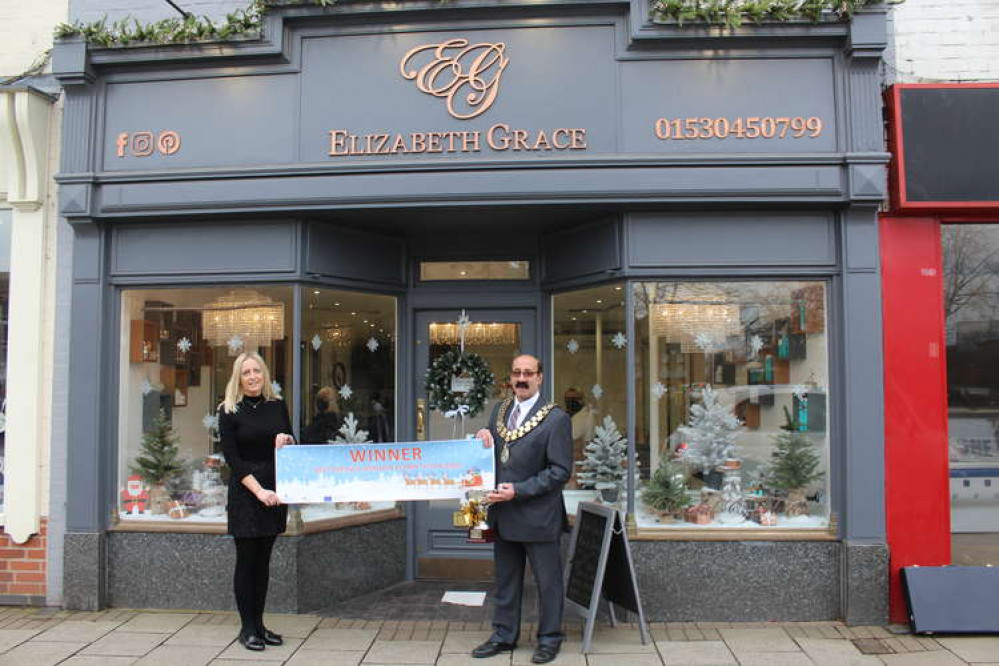 Last year's best dressed Coalville window, Jodi Nicholson of Elizabeth Grace, with Councillor Virge Richichi, Chairman of North West Leicestershire District Council