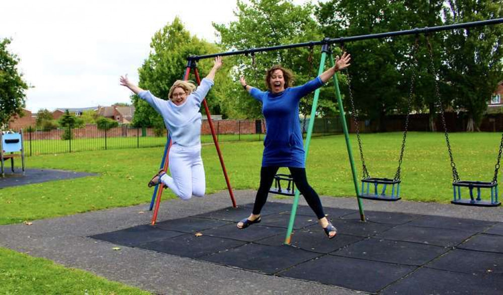 Sandra and Amy celebrate news of the new play area last area