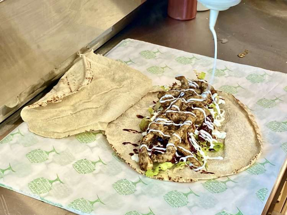 We tried the exceptionally tasty Shawarma wrap which you can see being prepared here