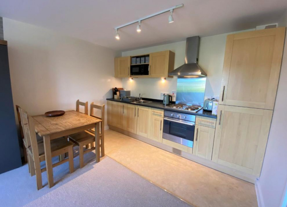 Open plan dining/kitchen area. 