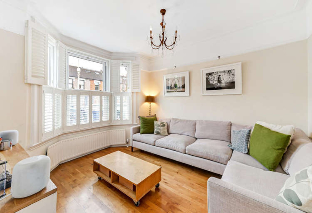 On the ground floor is a cosy front reception room (Image: Leslie & Co)