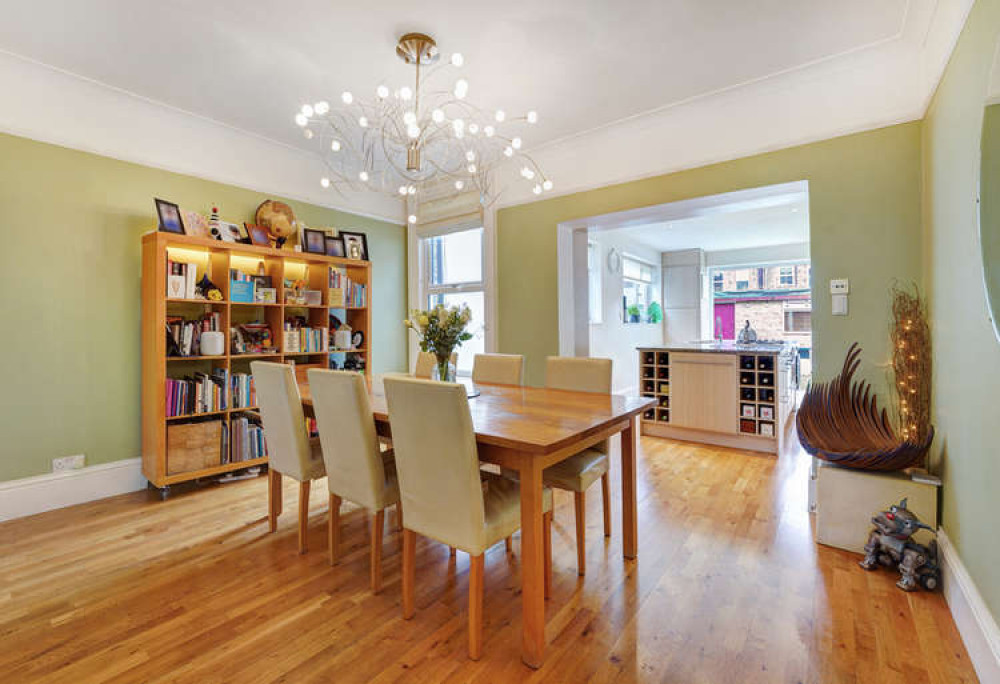 The current owners say the open-plan kitchen dining room has been perfect for entertaining over the years (Image: Leslie & Co)