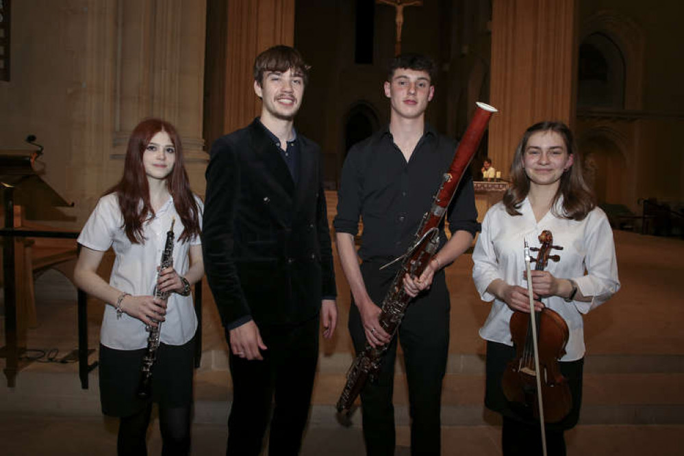 Composer Samuel D. Loveless (second from left), with St Benedict's musicians (Image: St Benedict's School)