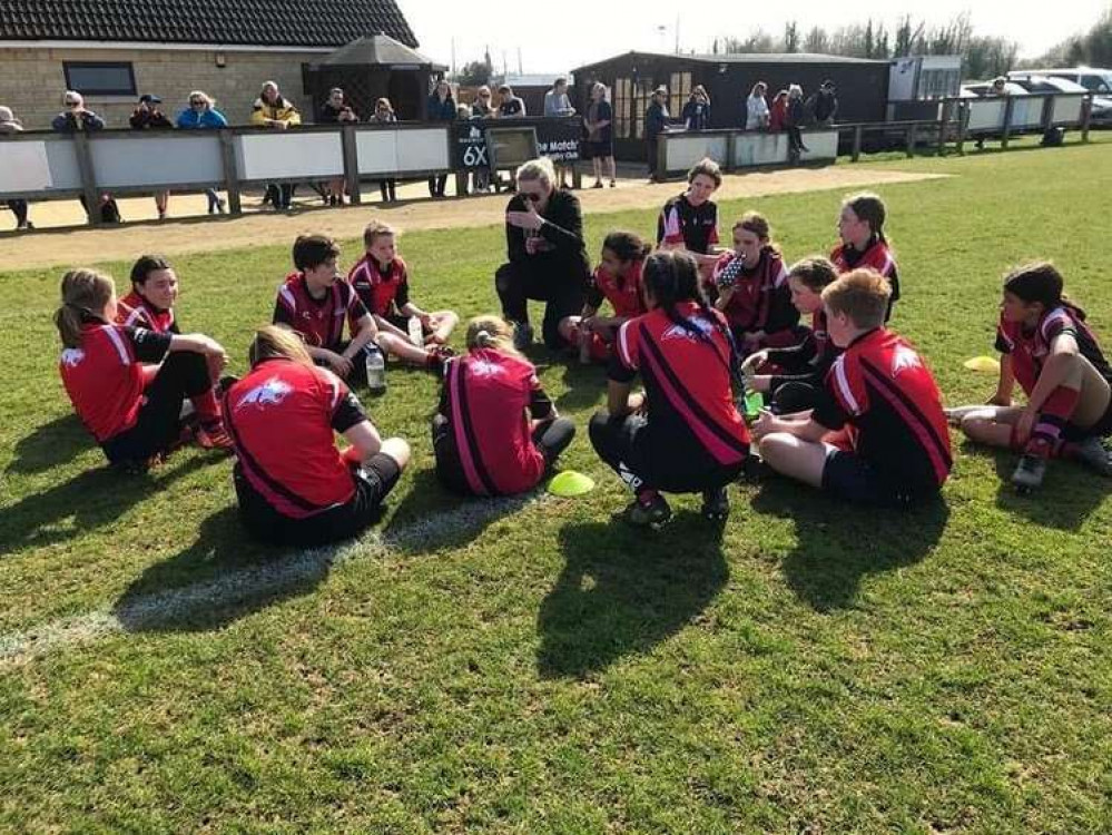 A team talk ahead of the 13s game