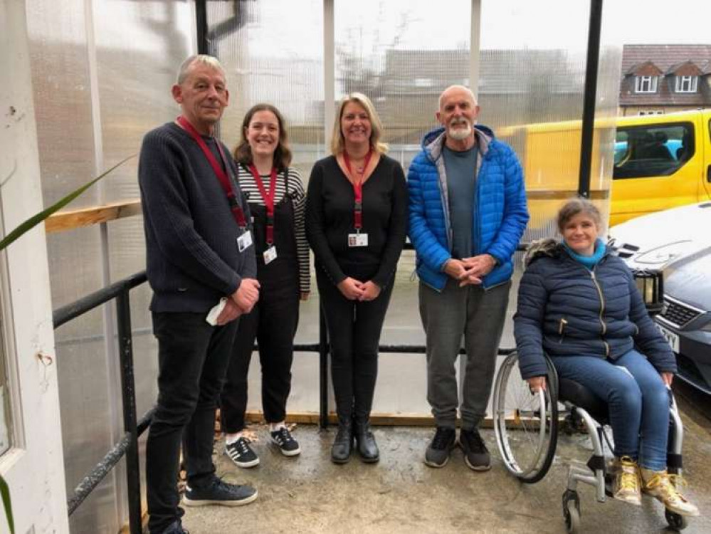 (left to right) Nick McCullough new Furniture Bank Coordinator, Rosie Oakley Coordinator, Lenka Grimes Coordinator, Bob Ashford Chair of Trustees, Karen Stewart Vice chair of Trustees outside of the existing building.