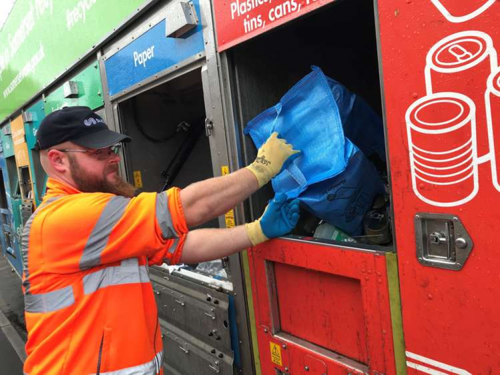 Recycling Being Loaded Into The New Suez Lorries By A Somerset Waste Partnership Employee. CREDIT: Somerset Waste Partnership. Free to use for all BBC wire