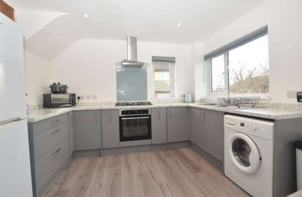 The kitchen at the three bed home on Nanscober Place. Shared by Bradleys Estate Agents Helston.