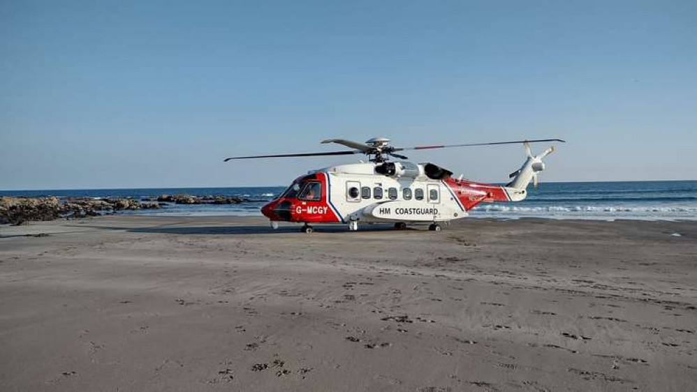 The coastguard helicopter on hand to airlift the casualty to hospital. Picture shared by Mullion Coastguard/Facebook.