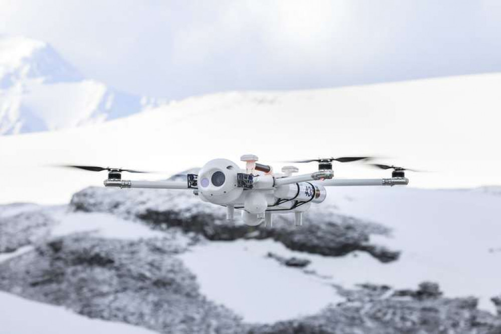 Pictures of the drone experts in Antarctica. Credit: Royal Navy.