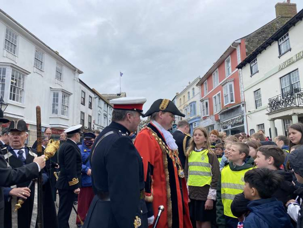 Helston Mayor Tim Grattan-Kane talks with local children after the parade.