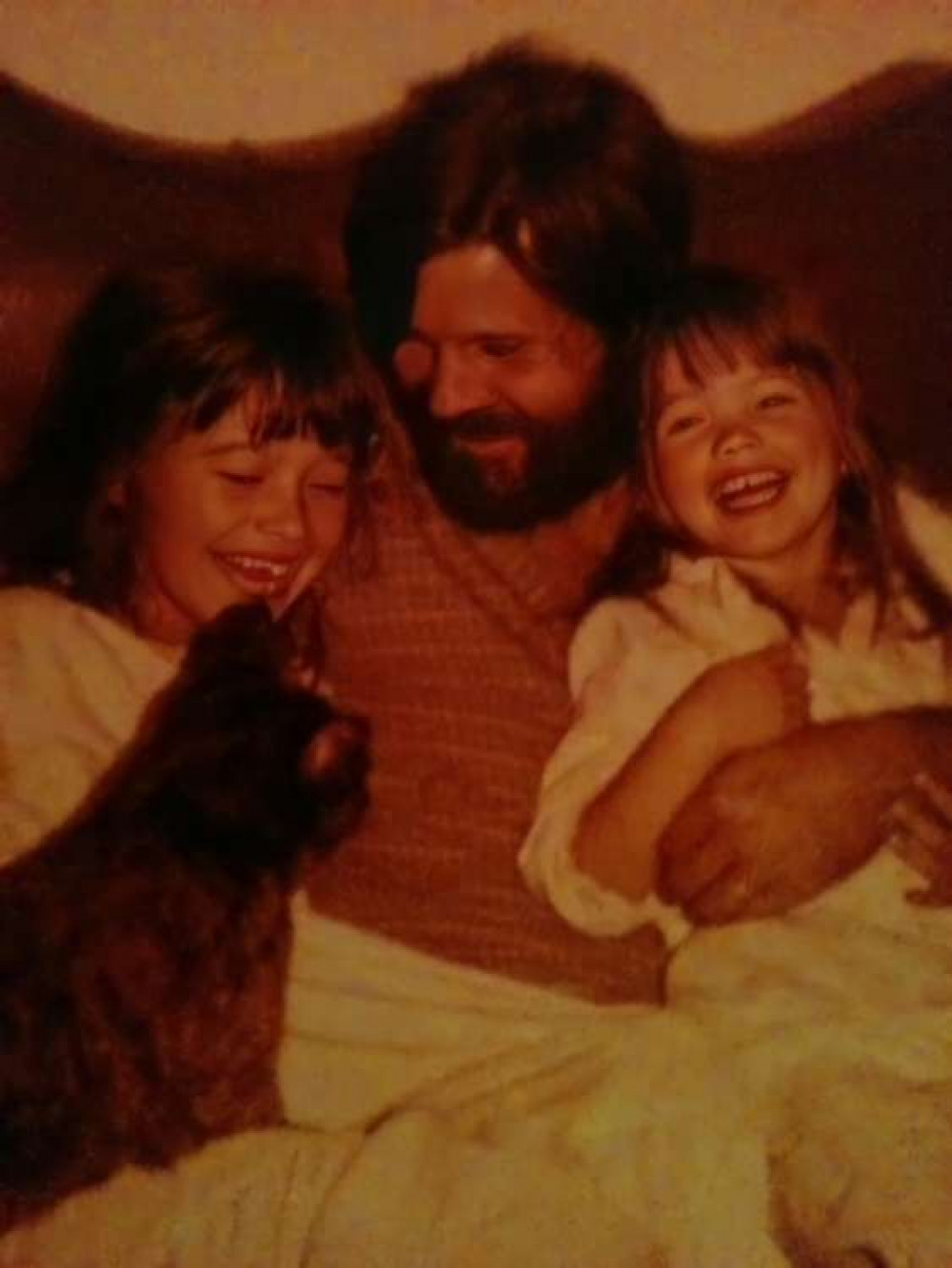 Vicki with her father and her sister.