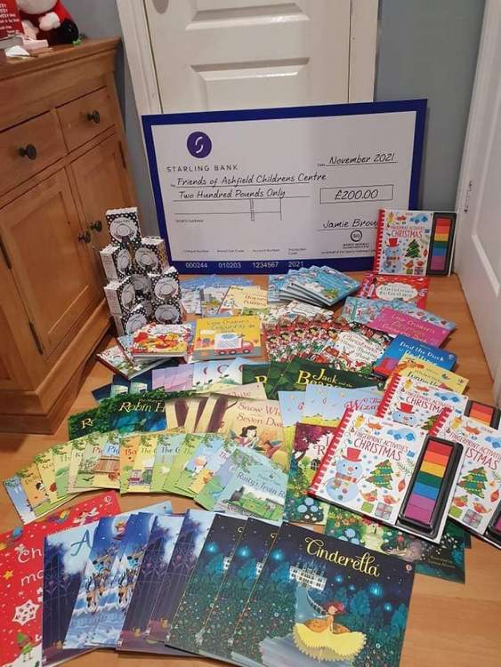 The money has helped the charity to buy nearly 400 new books. Photo courtesy of Sports Gateway Community.