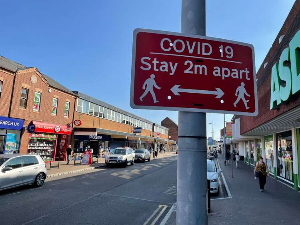 A Covid 19 sign in Arnold town centre. Image: LDRS