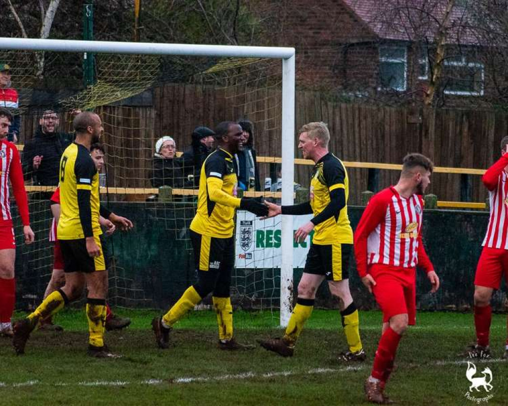 Craig Westcarr is congratulated after scoring his first of five goals against Borrowash Victoria on Saturday. Photo Credit: Lee Fox Photographs.