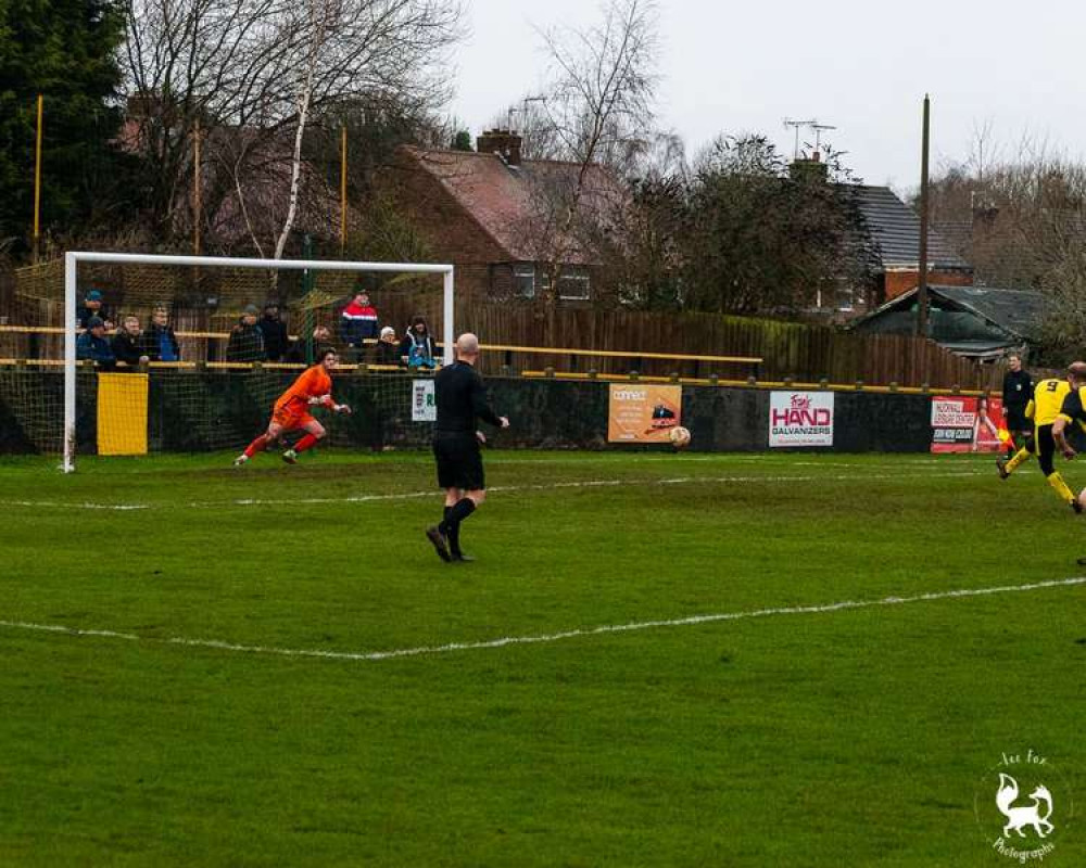 Craig Westcarr thumps home a penalty to give Hucknall the lead against Borrowash Victoria on Saturday. Photo Credit: Lee Fox Photographs.