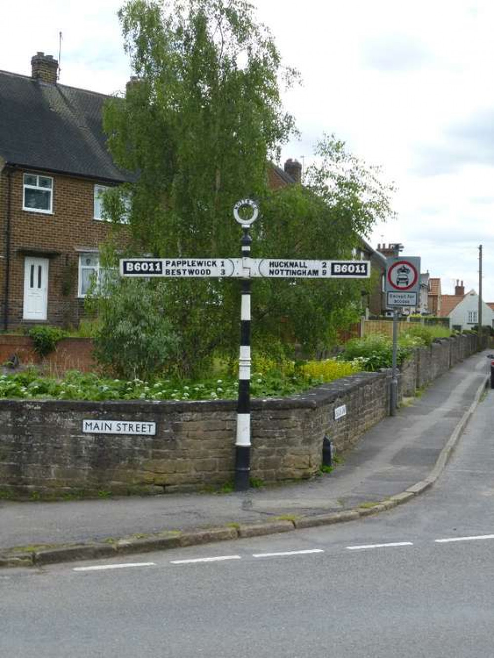 The junction of Main Street and Church Lane in Linby village. The planning application relates to land further down Church Lane. Photo © Alan Rosevear (cc-by-sa/2.0).