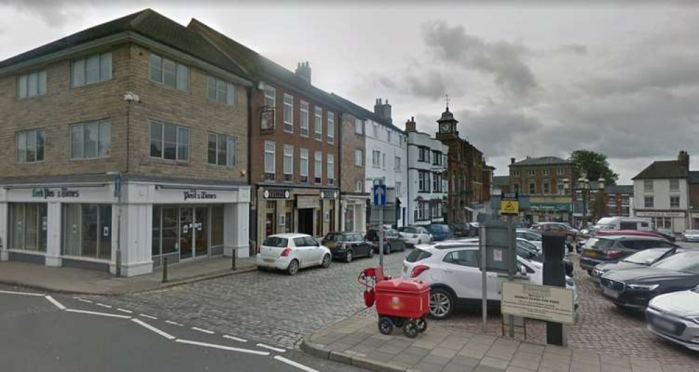 Cars parked at Market Place in Leek.