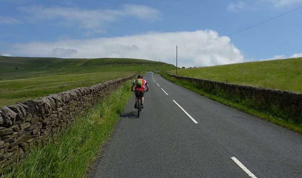 A cyclist in Wildboarclough, Macclesfield. © Copyright Richard Law CC 2.0 Cropped bit.ly/3DH6YS5 A cyclist in Wildboarclough, Macclesfield. © Copyright Richard Law CC 2.0 Cropped bit.ly/3DH6YS5