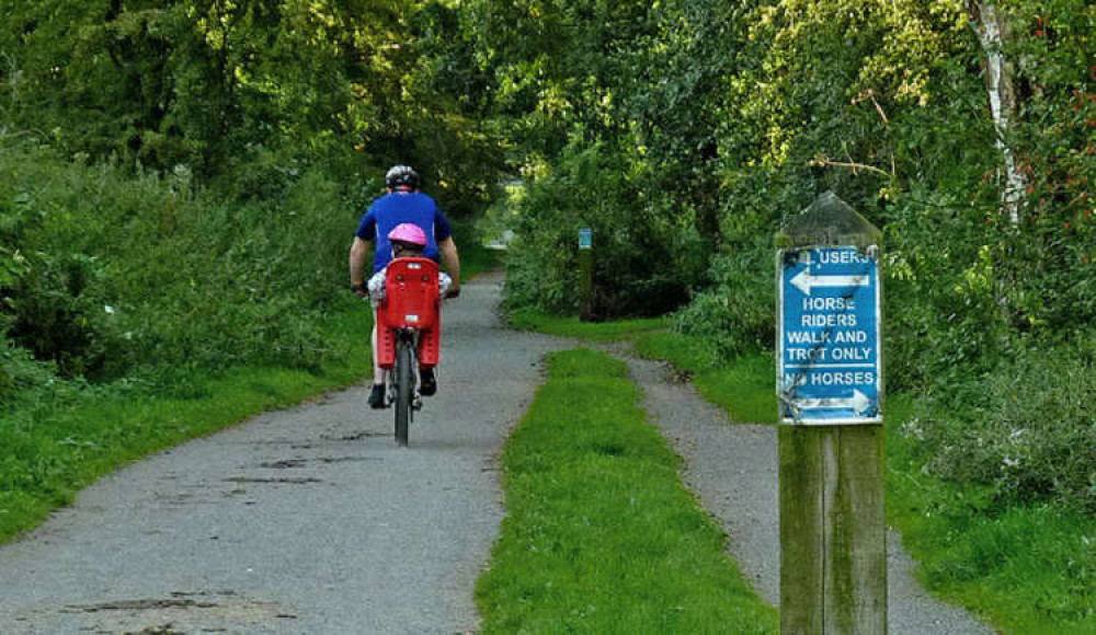 Would you like to see more cycle lanes and trails in Macclesfield? Pictured is a family cycling in the Macclesfield parliamentary constituency town of Poynton, on the Middlewood Way. © Copyright Roger Kidd / CC 2.0 Cropped bit.ly/3cFfw05 Would you like to see more cycle lanes and trails in Macclesfield? Pictured is a family cycling in the Macclesfield parliamentary constituency town of Poynton, on the Middlewood Way. © Copyright Roger Kidd / CC 2.0 Cropped bit.ly/3cFfw05
