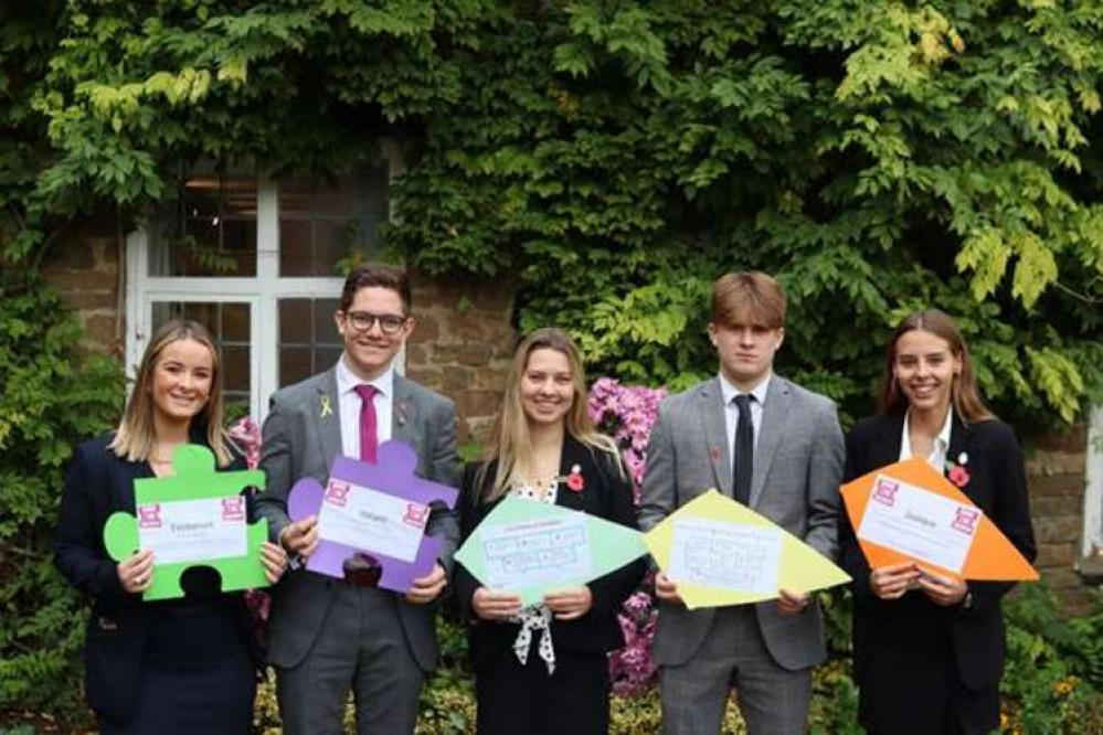 Oakham School pupils displaying their anti-bullying posters