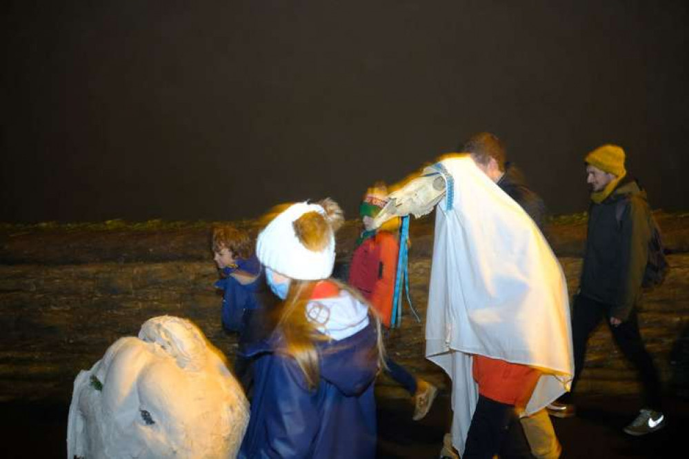 Penarth families celebrate Hen Galan by rolling a giant head down to the beach from the Clifftops Penarth families celebrate Hen Galan by rolling a giant head down to the beach from the Clifftops