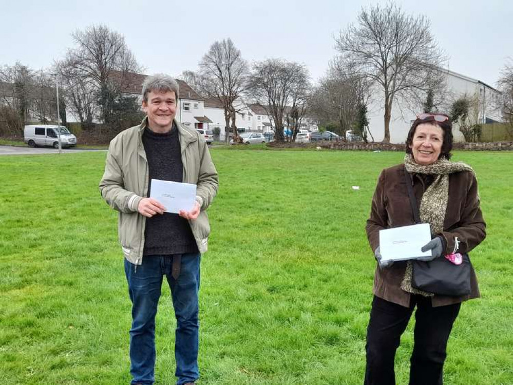 Community Councillors Richard Grigg and Anne Asbrey distributing consultation papers