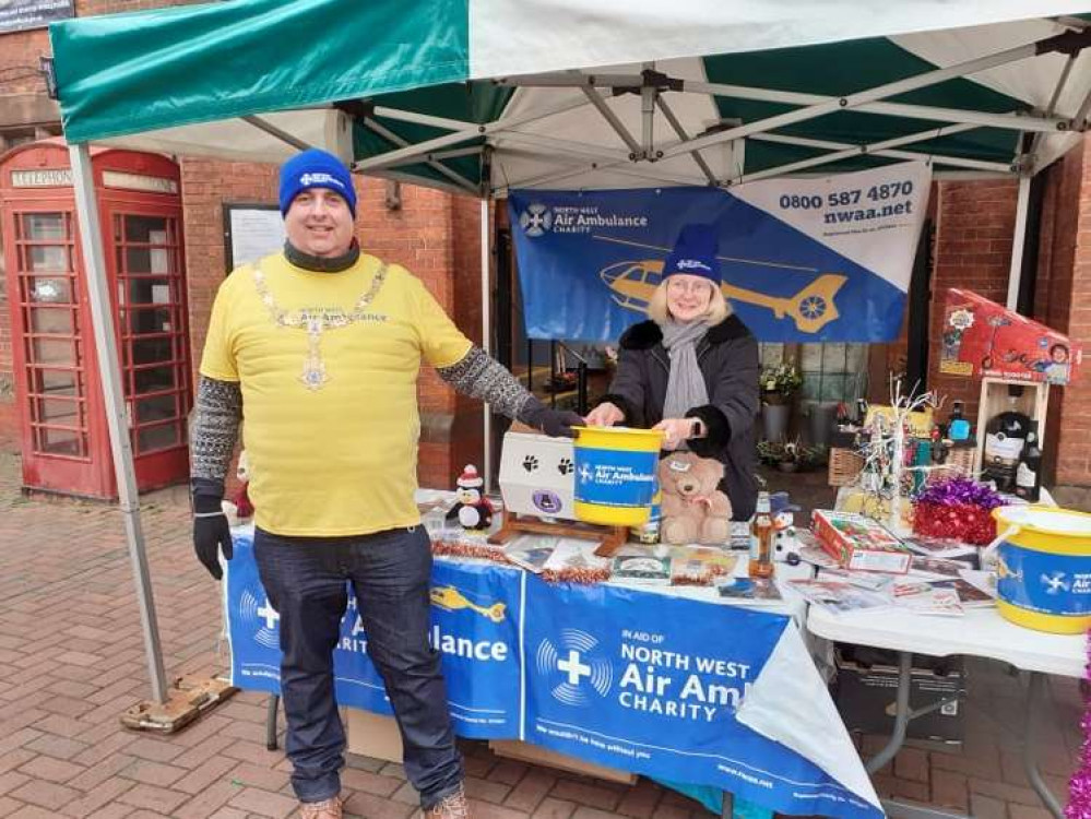 Cllr Price Jones and his consort Christina Price Jones at the stall in Sandbach on Saturday