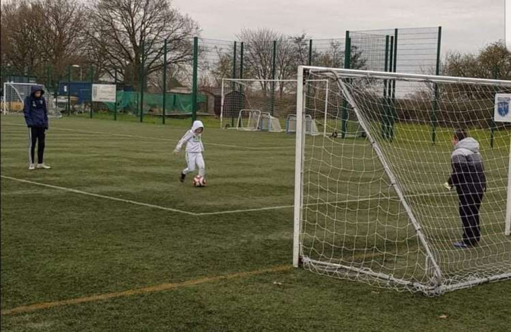 Children enjoying football at the party for  South Cheshire CLASP at Sandbach United