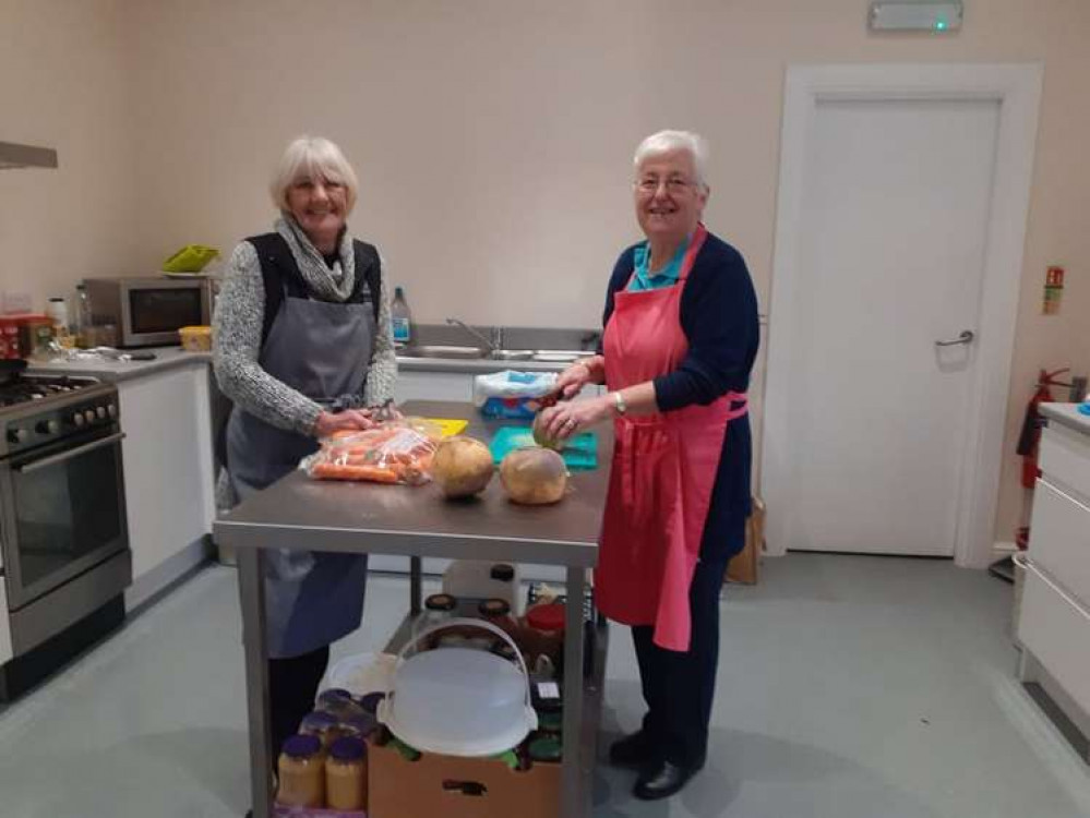 Jean Ellershaw and Trish Jones busy preparing the vegetables for tomorrow's Burns lunch